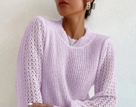 Оригінальний жіночий пуловер спицями